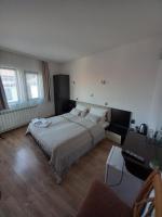 Postel nebo postele na pokoji v ubytování Guest house Skabrin