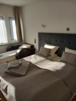 Postel nebo postele na pokoji v ubytování Guest house Skabrin