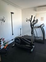 a room with a gym with a treadmill at ibis Itu Plaza Shopping in Itu