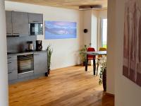 A kitchen or kitchenette at Alpenapart Singer - contactless check-in