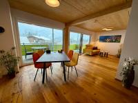 A seating area at Alpenapart Singer - contactless check-in