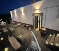 Khu vực ghế ngồi tại B&B Resort Palazzo Pirozzi