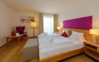 Łóżko lub łóżka w pokoju w obiekcie Hotel Walserwirt