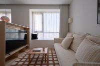 John's Apartmentにあるベッド