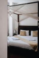 Suite Home Boutique Hotelにあるベッド