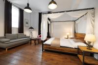 A bed or beds in a room at Vintagehome Schönbrunn