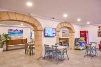 TV a/nebo společenská místnost v ubytování INNER Hotel Rupit "Adults Only"