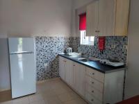 A kitchen or kitchenette at Canditas Studios