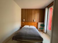 Posteľ alebo postele v izbe v ubytovaní Villa Prairie Mont-Dore 7 Appartements
