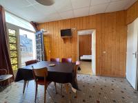 Televízia a/alebo spoločenská miestnosť v ubytovaní Villa Prairie Mont-Dore 7 Appartements