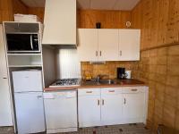 Kuchyňa alebo kuchynka v ubytovaní Villa Prairie Mont-Dore 7 Appartements