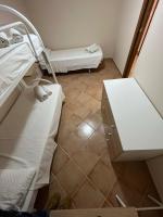 Posteľ alebo postele v izbe v ubytovaní Casa Gioeni