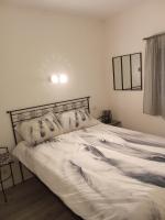 Łóżko lub łóżka w pokoju w obiekcie Maison coquette en Camargue