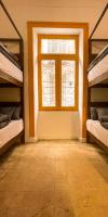 Ithaka Raml Hostelにあるベッド
