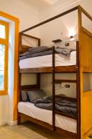 Ithaka Raml Hostelにあるベッド