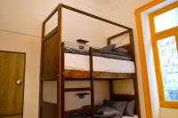 Ithaka Raml Hostelにあるベッド