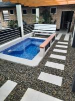 BIDESI VILLA Apartmentsの敷地内または近くにあるプール