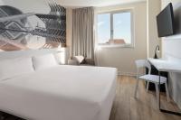 Postel nebo postele na pokoji v ubytování B&B HOTEL Valencia Ciudad de las Ciencias