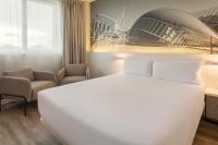 Postel nebo postele na pokoji v ubytování B&B HOTEL Valencia Ciudad de las Ciencias