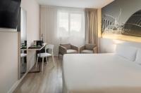 Postel nebo postele na pokoji v ubytování B&B HOTEL Valencia Ciudad de las Ciencias