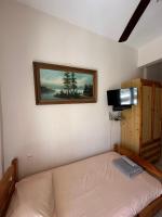 Televízia a/alebo spoločenská miestnosť v ubytovaní Tsatsalmas Rooms with sea View