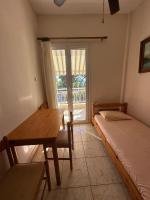 Posteľ alebo postele v izbe v ubytovaní Tsatsalmas Rooms with sea View