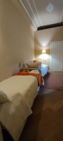A bed or beds in a room at The Como Secret Garden