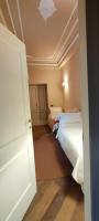 A bed or beds in a room at The Como Secret Garden