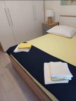 Postel nebo postele na pokoji v ubytování Apartment Alba
