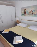Postel nebo postele na pokoji v ubytování Apartment Alba