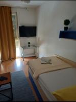 Postel nebo postele na pokoji v ubytování Apartment Alba