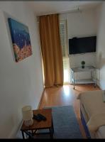 TV a/nebo společenská místnost v ubytování Apartment Alba