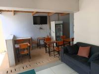 Гостиная зона в Stadium View Executive Guest House