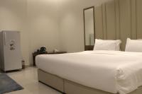 سمت النرجس للشقق المخدومة - Samt Al Narjis Serviced Apartmentsにあるベッド