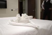 سمت النرجس للشقق المخدومة - Samt Al Narjis Serviced Apartmentsにあるベッド