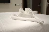 سمت النرجس للشقق المخدومة - Samt Al Narjis Serviced Apartmentsにあるベッド