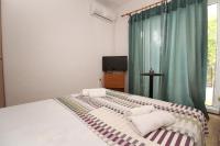 Posteľ alebo postele v izbe v ubytovaní Apartments Mul