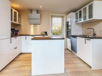 Kuchyň nebo kuchyňský kout v ubytování 10 person holiday home in Rødvig Stevns-By Traum