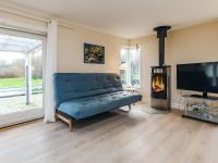 TV a/nebo společenská místnost v ubytování 10 person holiday home in Rødvig Stevns-By Traum