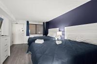 Ein Bett oder Betten in einem Zimmer der Unterkunft Compass Cove 759 - Oceanfront