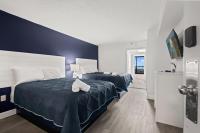 Ein Bett oder Betten in einem Zimmer der Unterkunft Compass Cove 759 - Oceanfront