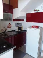 Kuchyňa alebo kuchynka v ubytovaní Apartment Ruzmarin