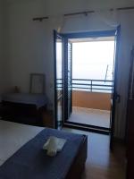 Posteľ alebo postele v izbe v ubytovaní Apartment Ruzmarin