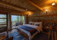 Kudrat - A Boutique Homestay- Tirthan Valleyにあるベッド