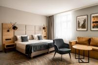 Łóżko lub łóżka w pokoju w obiekcie Hotel M29