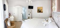 Postel nebo postele na pokoji v ubytování Myrtia - Cretan Guest House