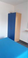 Postel nebo postele na pokoji v ubytování Apartments Bruna