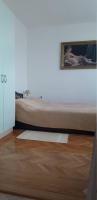 Postel nebo postele na pokoji v ubytování Apartments Bruna