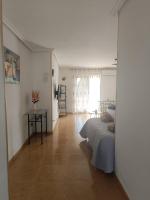 A bed or beds in a room at Bahía de Vera Estudio