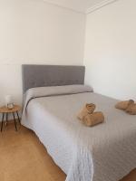A bed or beds in a room at Bahía de Vera Estudio